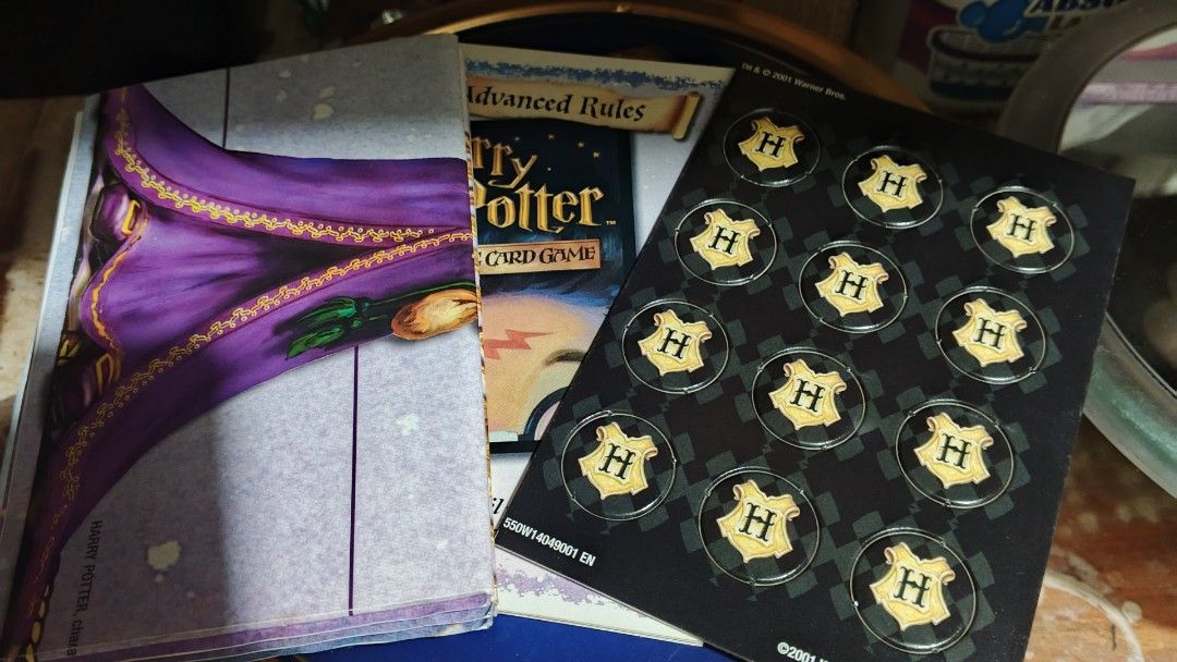 HARRY POTTER TCG (2001) Two Player Starter Set (Category: Raw Singles) located in Mandaluyong City. Submitted by toni_kun (Listing ID 1469282262, Image 2). Description: Harry Potter Trading Card Game: Two-Player Starter Set -complete set in good condition -minor shelf wear on the box Location: Sta Ana Manila.
