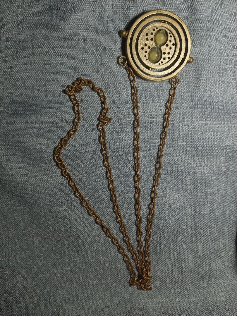 Harry Potter Time Turner with Sticker Book (Category: Other Merchandise) located in Davao. Submitted by aki_tsum (Listing ID 1469262279, Image 2). Description: *box slightly worn-out Davao Based Delivery only (buyer will shoulder delivery/shipping fee).