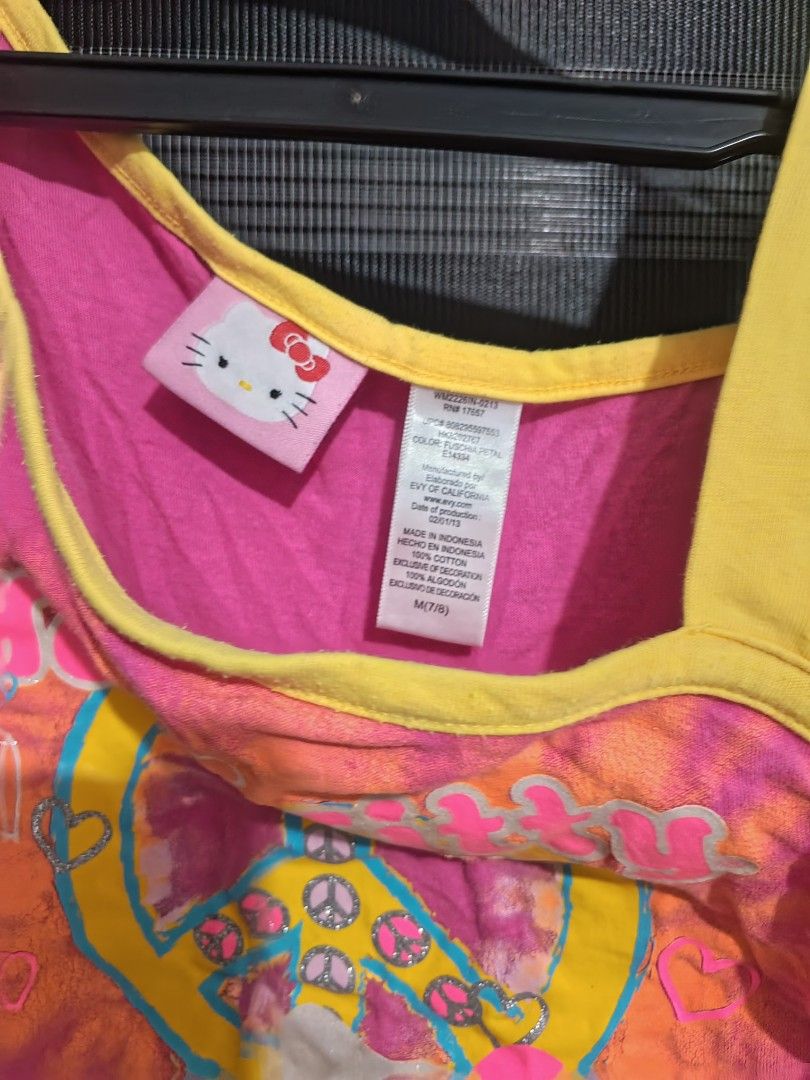 Hello kitty Fringe Tank top (Category: Blouses) located in Tarlac. Submitted by yohfinds (Listing ID 1469318884, Image 2). Description: has some major flaws. (check photos holes) offer price cz idk how to price this one..
