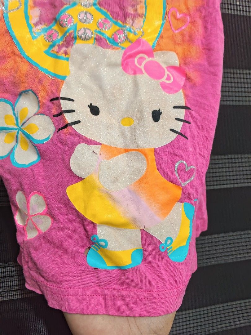 Hello kitty Fringe Tank top (Category: Blouses) located in Tarlac. Submitted by yohfinds (Listing ID 1469318884, Image 3). Description: has some major flaws. (check photos holes) offer price cz idk how to price this one..