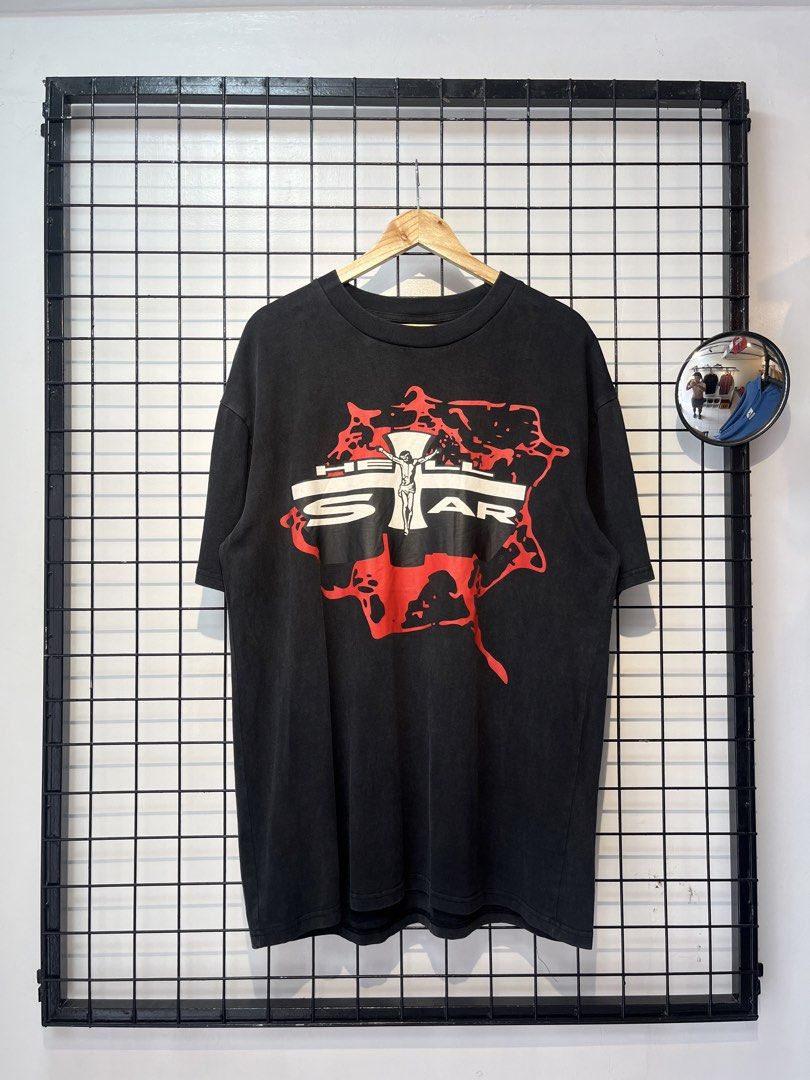 Hellstar Path To Paradise T-Shirt Black Size L (Category: Tshirts & Polo Shirts ) located in Taal. Submitted by thrift_deals23 (Listing ID 1469184783, Image 1). Description: - Brand new with tags attached - Color: Washed black - Size: Large - Front design: Crucifix graphic with Hell Star lettering - Back design: 'Path To Paradise' in red distressed text.