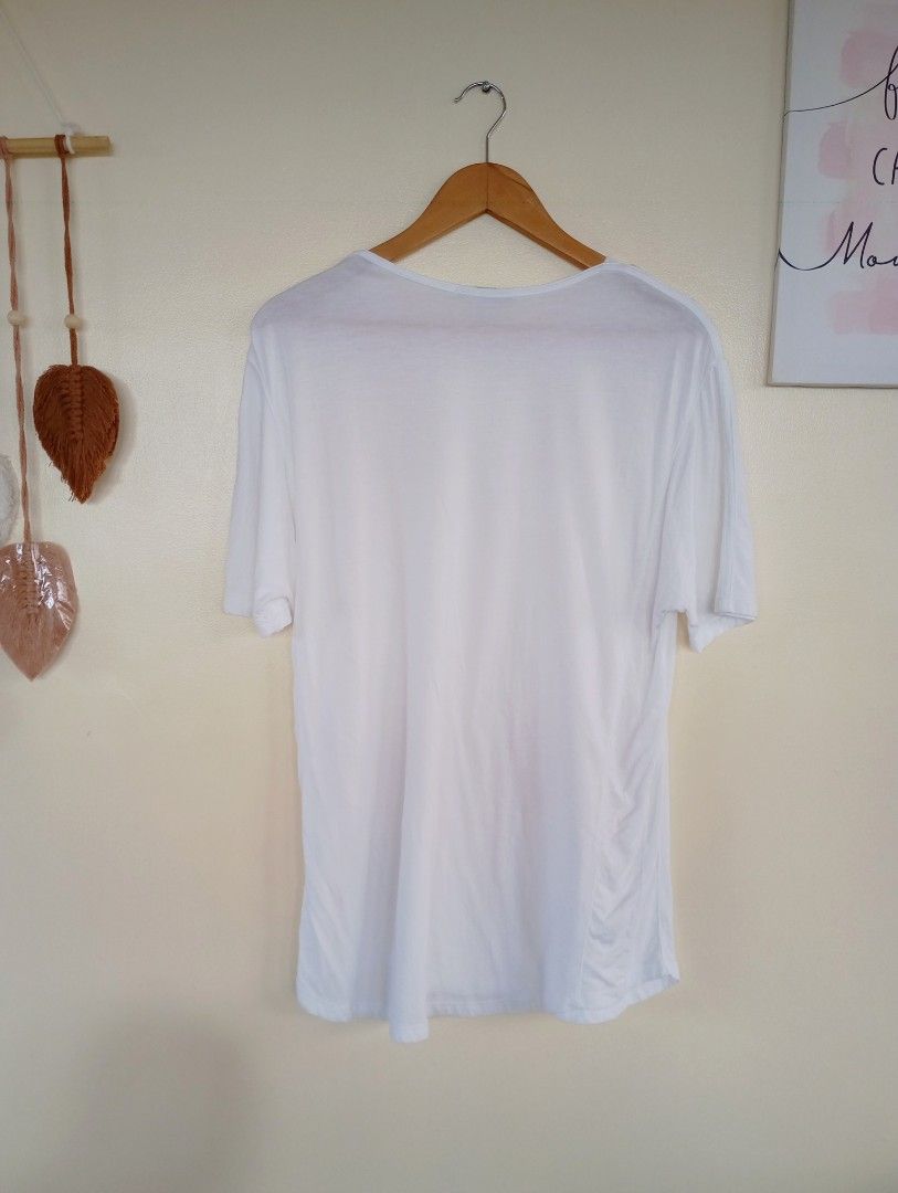 Helmut Lang (Category: Shirts) located in Puerto Princesa. Submitted by sefynna96 (Listing ID 1469278093, Image 3). Description: ✨Cream colored in actual ✨was sized small but can fit large body frame ✨ stretchy, cotton fabric ✨ clean, no stains or holes.