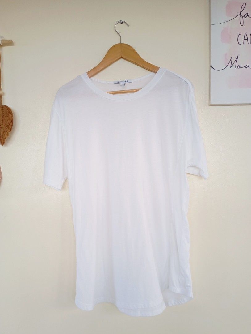 Helmut Lang (Category: Shirts) located in Puerto Princesa. Submitted by sefynna96 (Listing ID 1469278093, Image 2). Description: ✨Cream colored in actual ✨was sized small but can fit large body frame ✨ stretchy, cotton fabric ✨ clean, no stains or holes.
