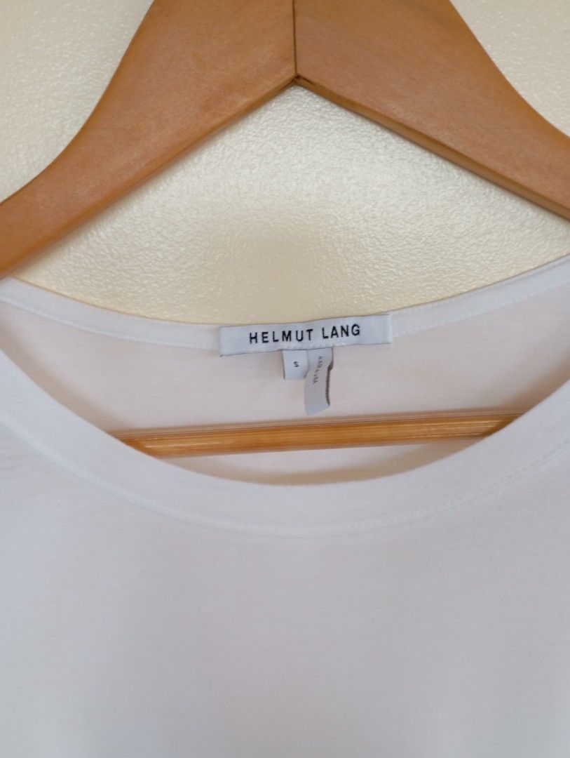 Helmut Lang (Category: Shirts) located in Puerto Princesa. Submitted by sefynna96 (Listing ID 1469278093, Image 1). Description: ✨Cream colored in actual ✨was sized small but can fit large body frame ✨ stretchy, cotton fabric ✨ clean, no stains or holes.