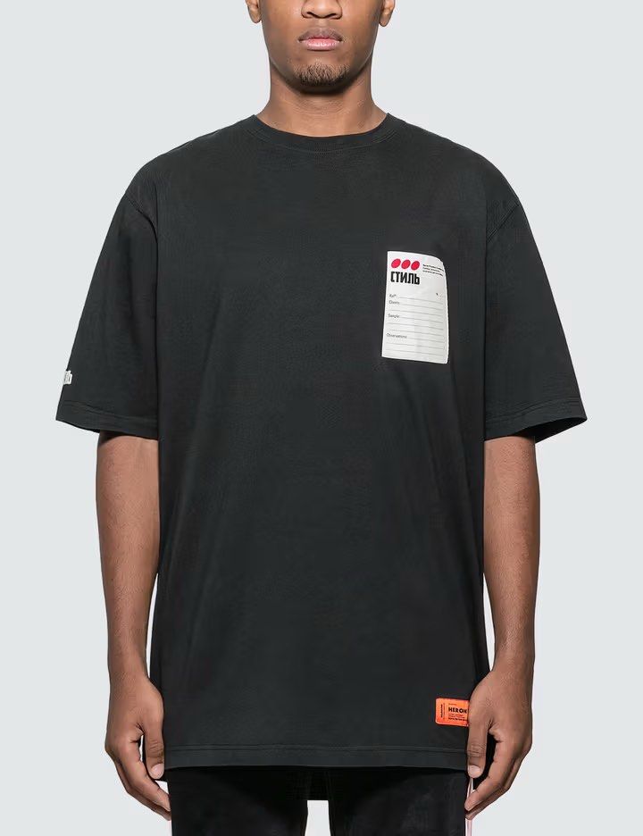 Heron Preston - Black Sticker Label Tshirt (Category: Tshirts & Polo Shirts ) located in Manila. Submitted by wdpworldwide (Listing ID 1469273953, Image 1). Description: Size Small on tag best fits Large Mens 9/10 Good Condition No Flaw No Inclusions Authentic 800.
