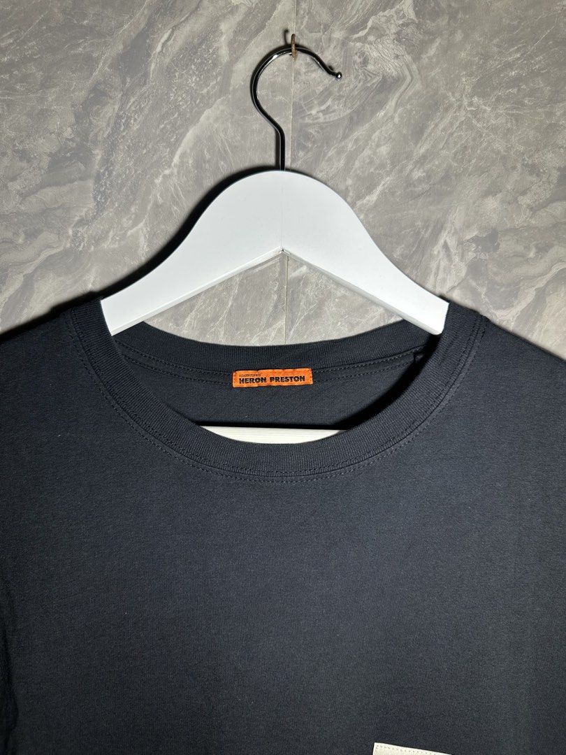 Heron Preston - Black Sticker Label Tshirt (Category: Tshirts & Polo Shirts ) located in Manila. Submitted by wdpworldwide (Listing ID 1469273953, Image 3). Description: Size Small on tag best fits Large Mens 9/10 Good Condition No Flaw No Inclusions Authentic 800.
