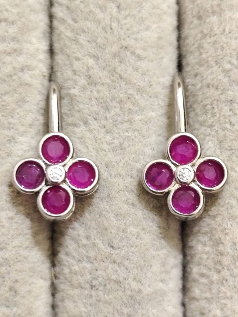 HIGH QUALITY Natural Burmese Four Leaf Clover Ruby Dangling Earrings (UV REACTIVE!) (Category: Earrings) located in Mandaluyong City. Submitted by allaboutgemsandco (Listing ID 1469169494, Image 2). Description: HIGH QUALITY Natural Burmese Four Leaf Clover Ruby Dangling Earrings (UV REACTIVE!) Stone Size: 3mmx3mm*8 stones Price: Php 600 add shipping fee for less than Php 1000 REASON FOR SALE: Clearing out my collection. Bought from Myanmar. See 