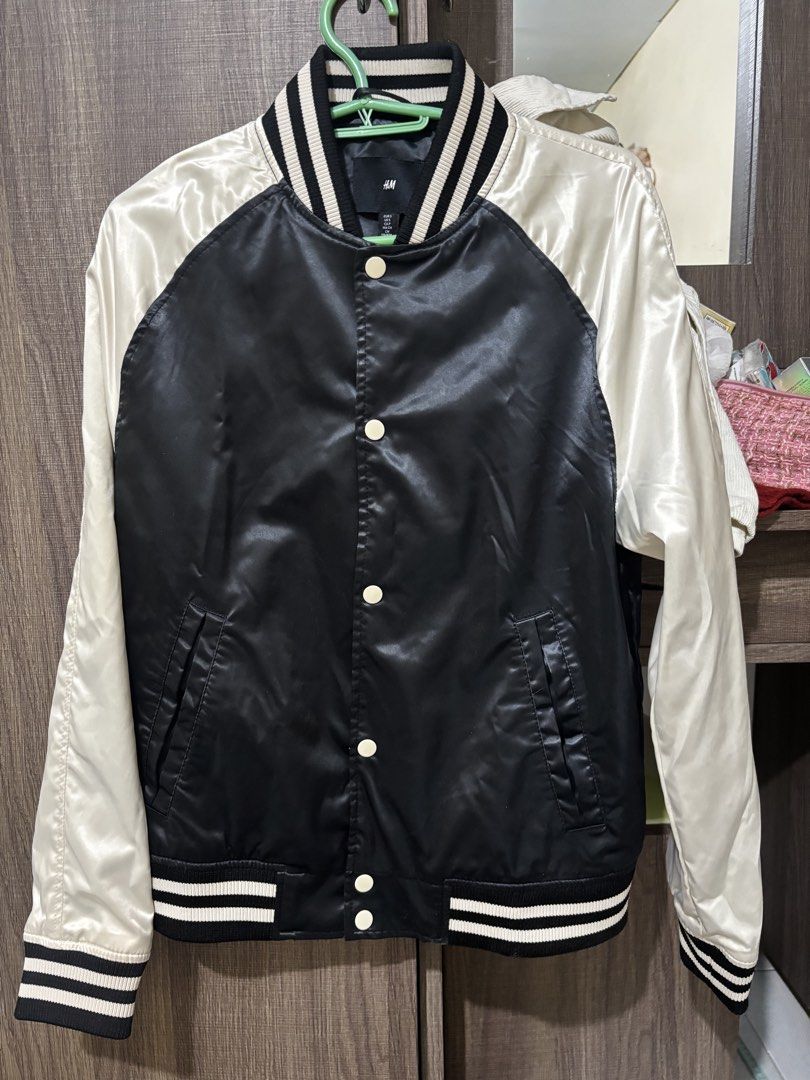 H&M Black and White Varsity Jacket (Category: Coats, Jackets and Outerwear) located in Magalang. Submitted by mvenetri (Listing ID 1469323128, Image 1). Description: H&M Black and White Varsity Jacket - Size S but fits S-Semi L girlies - Snap button closure, striped ribbed collar, cuffs, and hem, plus two front welt pockets - Barely used, like new condition!.