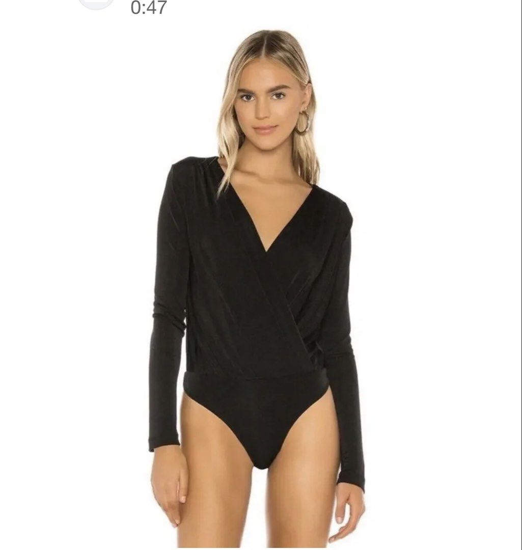 H&M Black Long sleeve Bodysuit (Category: Others Tops) located in Quezon City. Submitted by chrizcboutique (Listing ID 1469188659, Image 1). Description: H&M Black Longsleeve bodysuit medium in tag made in Cambodia stretchy material Measurements laid in flat shoulder to shoulder approx 16 inches armpit to armpit approx 19 inches waist approx 17inches Condition still in good condition lightly used no visible flaws please not that the first photo i