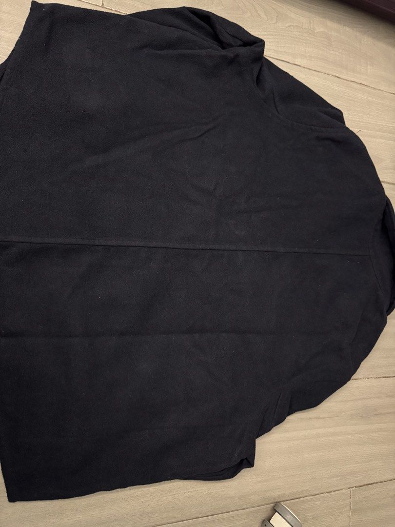 H&M Black Oversized Button-Up Jacket (Category: Coats, Jackets and Outerwear) located in Taguig. Submitted by sqaumejada (Listing ID 1469163442, Image 3). Description: - Brand: H&M - Color: Navy Blue - Size: XL - Details: Gold-tone hardware buttons on front, cuffs, and dual chest pockets - Style: Classic collar with structured back seams - Material: Thick, fleece-like textured fabric (warm for cooler days) - Condition: Clean and well maintained.