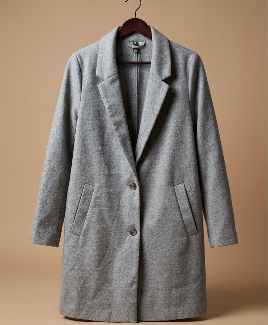 H&M Divided Grey Wool Coat Size L (Category: Coats, Jackets and Outerwear) located in Marikina City. Submitted by sakura_07 (Listing ID 1469293184, Image 1). Description: - Brand: H&M Divided - Size: L (true to standard sizing) - Color: Versatile grey (goes with everything) - Design: Classic notched lapel and double-button front closure - Features: Two front welt pockets and clean inner lining - Condition: Warm, cozy, and ready for a new home.