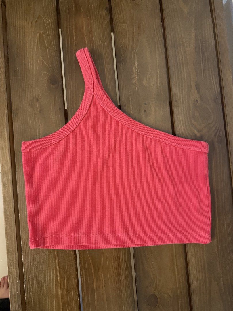 H&M Pink One Shoulder Ribbed Crop Top (Category: Sleeveless) located in Antipolo. Submitted by aiyecandl (Listing ID 1469306759, Image 3). Description: - Brand: H&M - Color: Bright pink - Style: One-shoulder crop top - Fabric: Ribbed, super stretchy, and comfortable - Condition: Well loved but still in great shape.