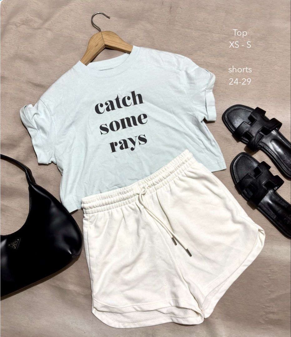 H&M White Sweatshirt Shorts & Light Blue Catch Some Rays Tee (Category: Skirts) located in Caloocan City. Submitted by nnnprelovedclothes (Listing ID 1469384363, Image 1). Description: - Short sleeves with trendy rolled cuffs - H&M cream white shorts in size EUR XS - Shorts feature ultra-soft fleece lining inside - Elastic drawstring waistband with metal tips for a secure fit - Perfect ready-to-wear casual weekend outfit combination.