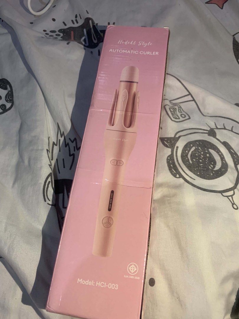 Hodekt Style Automatic Curler Model HCI-003 Pink (Category: Hair) located in Manila. Submitted by zenwind.23537e (Listing ID 1469312463, Image 2). Description: - Brand/Model: Hodekt Style HCI-003 Automatic Hair Curler - Color: Cute pink - Feature: Auto-curling with a single press of a button for hassle-free styling - Condition/Inclusions: Comes with the original pink box and power cord - Ease of Use: Beginner-friendly, perfect for quick and easy 