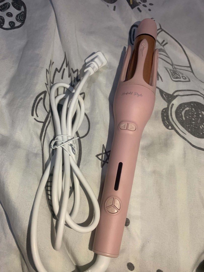 Hodekt Style Automatic Curler Model HCI-003 Pink (Category: Hair) located in Manila. Submitted by zenwind.23537e (Listing ID 1469312463, Image 1). Description: - Brand/Model: Hodekt Style HCI-003 Automatic Hair Curler - Color: Cute pink - Feature: Auto-curling with a single press of a button for hassle-free styling - Condition/Inclusions: Comes with the original pink box and power cord - Ease of Use: Beginner-friendly, perfect for quick and easy 