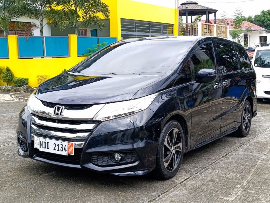 Honda Odyssey 2.4 EX (A) (Category: Used Cars) located in Antipolo. Submitted by kairo22 (Listing ID 1469338732, Image 2). Description: 2016 Honda Odyssey EX Navi Premium Twinkle Black Automatic Transmission With Paddle Shifter Push Button Start Stop Engine Captain Seat Power Sunroof 6 Airbags Cruise Control 7 inch Touchscreen Display With Navigation Bluetooth USB DVD 9 inch Rear LCD Display 360 Degree Multi View Camera Blind Spot Information Sys