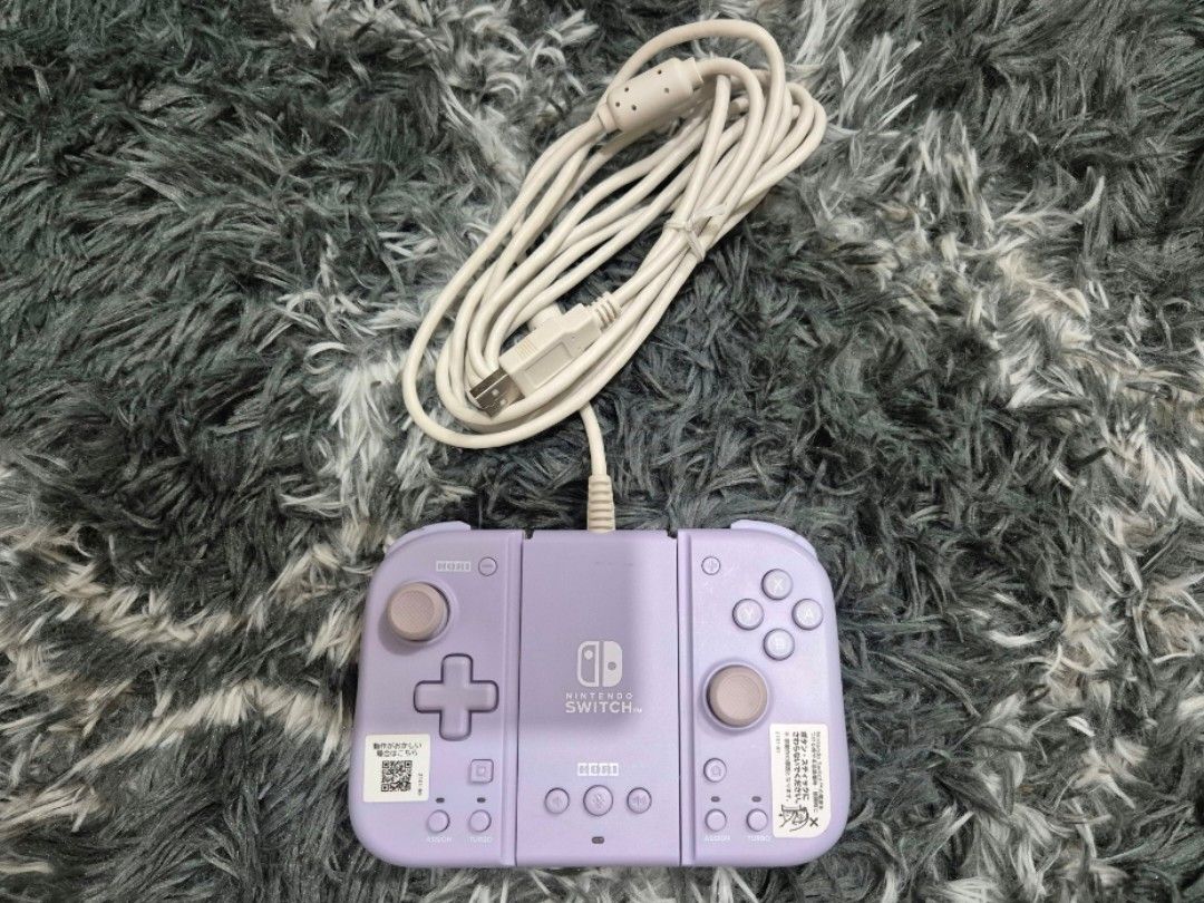 Hori Split Pad Fit (Category: Controllers) located in Makati City. Submitted by sharkdines (Listing ID 1469222368, Image 2). Description: Hori Split Pad for NSW Purple RFS: Decluttering Issue: a bit of yellowing (see pic).