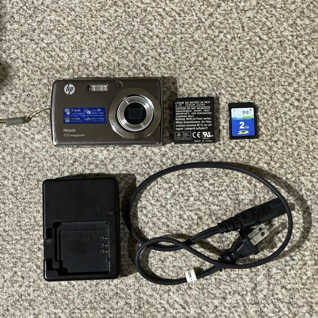 HP PB360t Digital Camera (Digicam) TOUCHSCREEN in SILVER with ACCESSORIES ! (Category: Cameras) located in Manila. Submitted by hailtothefilm (Listing ID 1469332521, Image 2). Description: 📸 HP PB360t Digital Camera (Digicam) TOUCHSCREEN in SILVER with ACCESSORIES ! for Sale 3,599! DESCRIPTION: ✅in PRISTINE body condition. ✅ crisp outputs ✅Tested, fully functioning. ✅ Fully functioning LCD, all sides ✅ 12.0 megapixel ✅ 3.0 inches screen ✅ One of