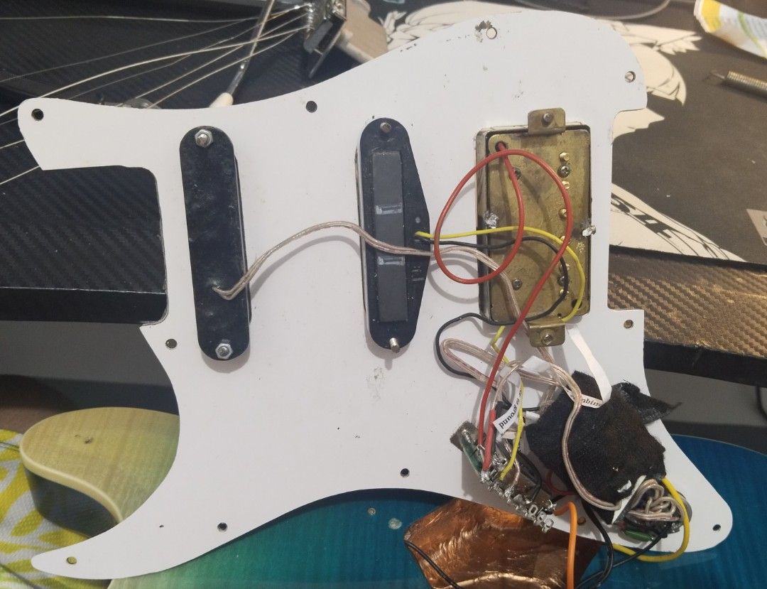 HSH Pickup set (Category: Musical Instruments) located in Dasmarinas. Submitted by zzzaddy (Listing ID 1469263951, Image 2). Description: For Sale HSH Wiring Harness, Rush 1500, negotiable. RfS: Funding a p90-humbucker combo in this thing instead. Components: Active Ceramic Neck, Ceramic Middle, Japan branded Humbucker bridge, no coilsplit. 5-way switch, 1V1T, both of the toggles are for the active neck. Battery compartment for the active neck, a