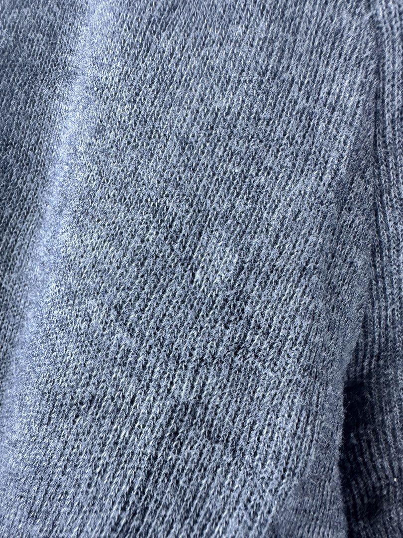Hugo Boss Grey Quarter Zip Sweater (Category: Coats, Jackets and Outerwear) located in Manila. Submitted by declutterpromax (Listing ID 1469215650, Image 3). Description: - Brand: Boss - Color: Grey - Style: Quarter-zip sweater with high mock neck - Details: Ribbed knit texture all over, black Boss logo zipper pull, metal logo tag near hem, and dark shoulder piping - Pit-to-Pit: 21 inches - Length: 24 inches - Sleeve Length: 23 inches - Condition