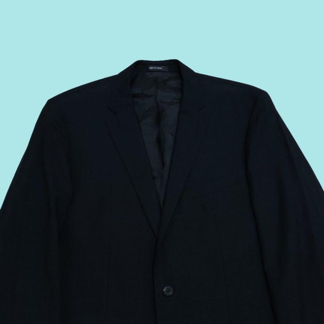 Hugo Boss Super 130 (Category: Coats, Jackets and Outerwear) located in Tarlac. Submitted by senkustuff (Listing ID 1469185536, Image 2). Description: - Brand: Hugo Boss - Color: Classic Black - Material: Premium Super 130 Wool - Origin: Made in Turkey - Style: Two-button closure, notched lapels, and flap pockets - Interior: Fully lined with multiple pockets and Hugo Boss branding - Condition: Excellent, clean lines with timeless tailoring Dimes 