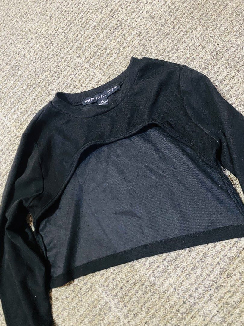 HYFVE Black Long Sleeve Crop Top Size M (Category: Longsleeves) located in Marikina City. Submitted by jessylady10 (Listing ID 1469333779, Image 2). Description: - Brand: HYFVE - Size: Medium - Color: Black - Design: Cut-out chest with sheer panel overlay, round neckline, long sleeves - Origin: Made in China - Condition: Mild wear under close inspection - Styling: Great for layered outfits or evening looks Gcash payment, Lalamove delivery.