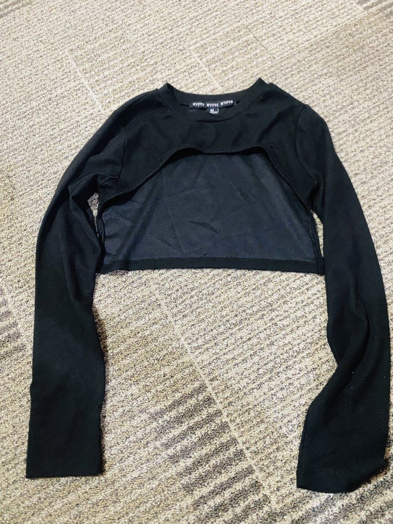 HYFVE Black Long Sleeve Crop Top Size M (Category: Longsleeves) located in Marikina City. Submitted by jessylady10 (Listing ID 1469333779, Image 1). Description: - Brand: HYFVE - Size: Medium - Color: Black - Design: Cut-out chest with sheer panel overlay, round neckline, long sleeves - Origin: Made in China - Condition: Mild wear under close inspection - Styling: Great for layered outfits or evening looks Gcash payment, Lalamove delivery.