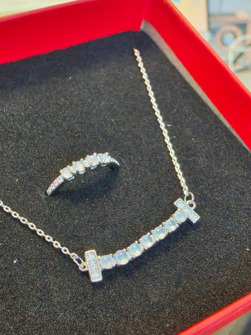 Icy Translucent Jade and Diamond Silver Necklace and Ring Set (Category: Necklaces) located in Manila. Submitted by jadeitesph (Listing ID 1469333450, Image 1). Description: - Material: Premium silver with delicate chain links - Stones: Beautiful round transparent natural jade set on a curved bar design - Accents: Tiny sparkling diamonds on the ends and chain connectors - Set Includes: Matching necklace and ring - Packaging: Securely packed in a 