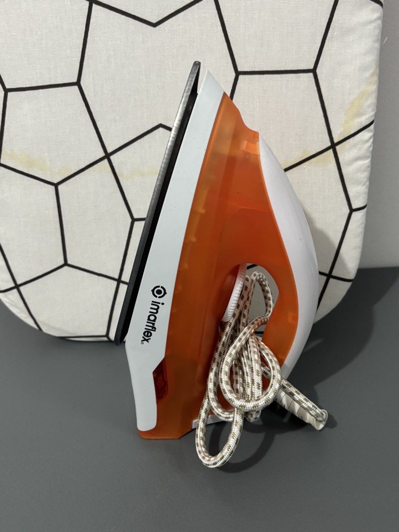 Imarflex Iron and Ikea Geometric Pattern Ironing Board (Category: Ironing Boards) located in Manila. Submitted by safefire.ae92b7 (Listing ID 1469357335, Image 2). Description: - Brand: Imarflex (iron); Ikea (iron board) - Features: Includes durable braided power cord - Bundle includes: Tabletop ironing board with modern geometric line pattern - Condition: Fully tested and working properly (minor discoloration on board cover).
