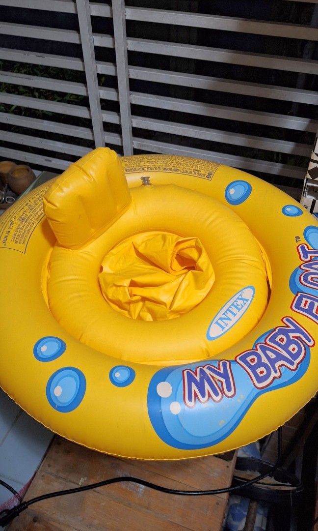Intex My Baby Float Inflatable Pool Ring (Category: Infant Playtime) located in Bulacan. Submitted by gtrvddg (Listing ID 1469253661, Image 1). Description: - Brand: Intex baby float - Color: Bright yellow with blue graphics and bubble design - Features: Built-in seat with secure leg holes for safe water play - Size: Standard toddler size - Condition: Like New (used once).