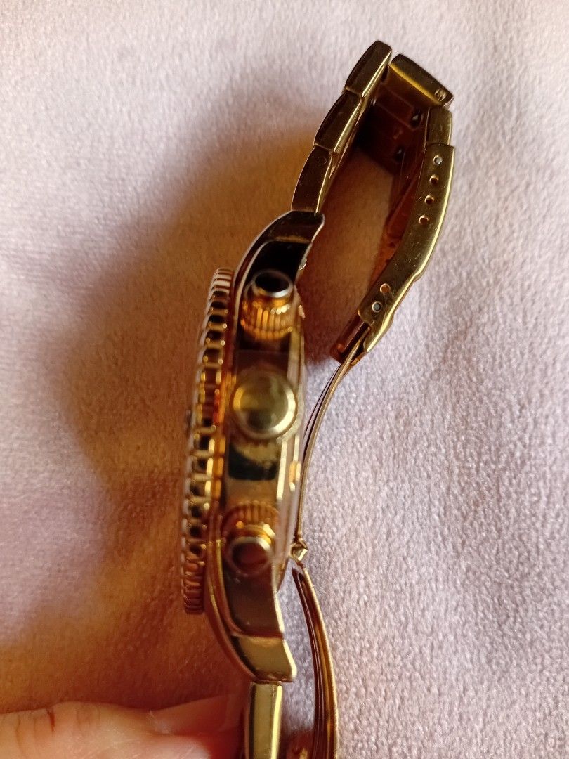 Invicta Specialty Model No. 0623 Chronograph Watch (Category: Men's Watches) located in Manila. Submitted by dayanlu05048 (Listing ID 1469196320, Image 3). Description: - Brand: Invicta Specialty Chronograph - Model: 0623 - Color: Gold-tone with eye-catching blue dial - Features: Three sub-dials, date window at 4 o'clock, 100m water resistance - Material: Stainless steel case and bracelet - Condition: Chronograph pushers and crown function perfec