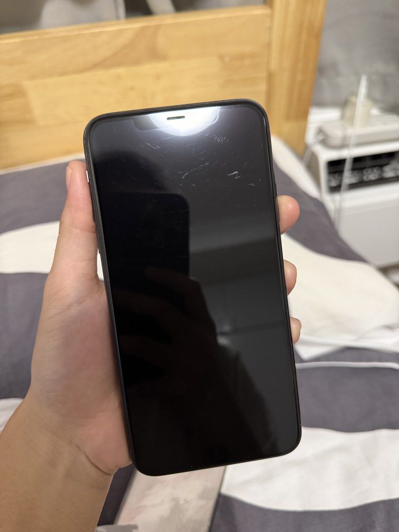 Iphone 11 Pro Max 64GB (Category: iPhone 11 Series) located in Pasig City. Submitted by mcetadc (Listing ID 1469282512, Image 2). Description: READ CAREFULLY!! Issues: -Scratches on phone screen (See Pictures) Iphone 11 Pro Max 64GB Midnight Green -No sim restrictions. -No other inclusions. Phone Only. -Battery Health 78% -No History of repairs. -All buttons working. -Face ID Working. For MEETUP ONLY. IWAS SCAM. CAPITOL COMMONS, PASIG CITY ONLY..