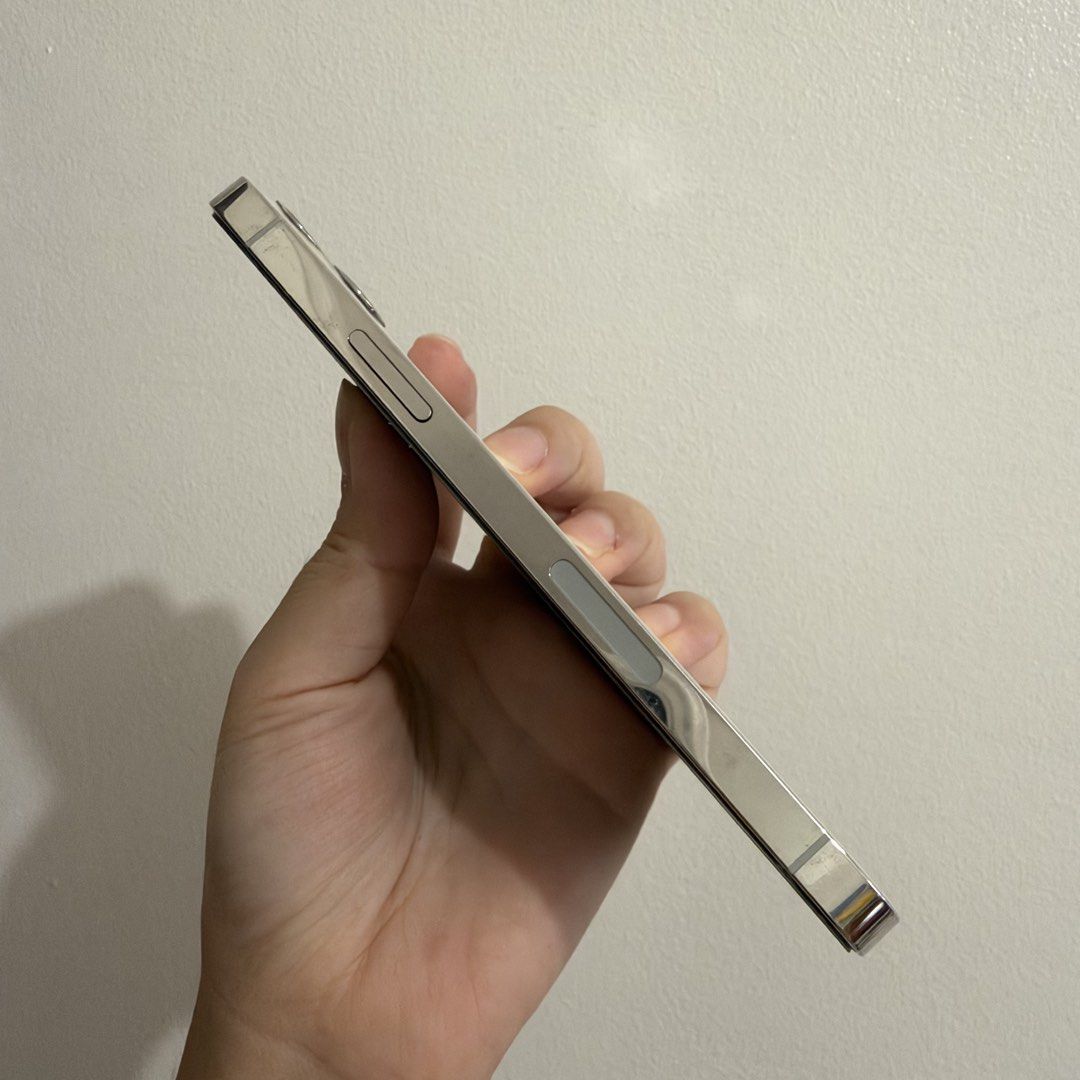iPhone 12 Pro 128GB US Variant (Category: iPhone 12 Series) located in Pasig City. Submitted by amdlt (Listing ID 1469189072, Image 3). Description: iPhone 12 Pro 128GB US Variant 69% battery health All original parts, no history of repair Signs of usage / dent posted No any other known issue.