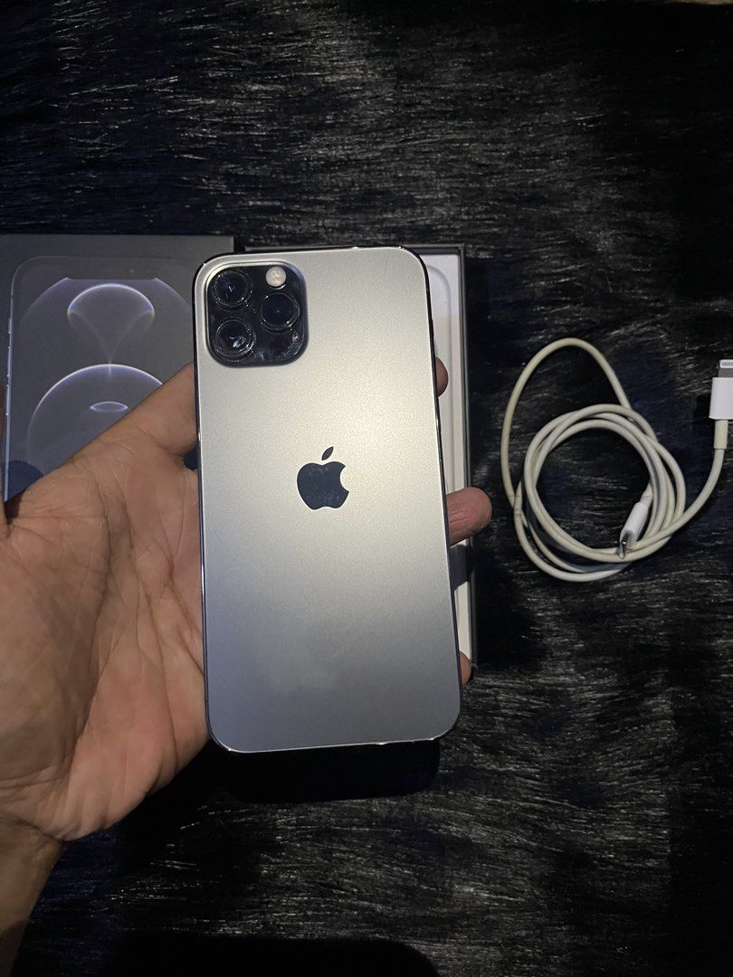 IPHONE 12 PRO (Category: iPhone 12 Series) located in Manila. Submitted by fiercerabbit-8a7e (Listing ID 1469330269, Image 2). Description: FOR SALE OR SWAP PO SA LOWER UNIT +cash (Iphone only) ‼️ Iphone 12 pro ₱15,000 ₱15,000 slightly NEGOTIABLE - 128GB - 77% BH (ORIGINAL, NEVER REPLACED.) - CH/A VARIANT (DUAL SIM) - FACE ID ✅ - True Tone ✅ - Physical Sim ✅ - No Sim Restrictions! - Unli Reset - Unli Update - ISSUE‼️Case mark ** NO HISTORY OF REP