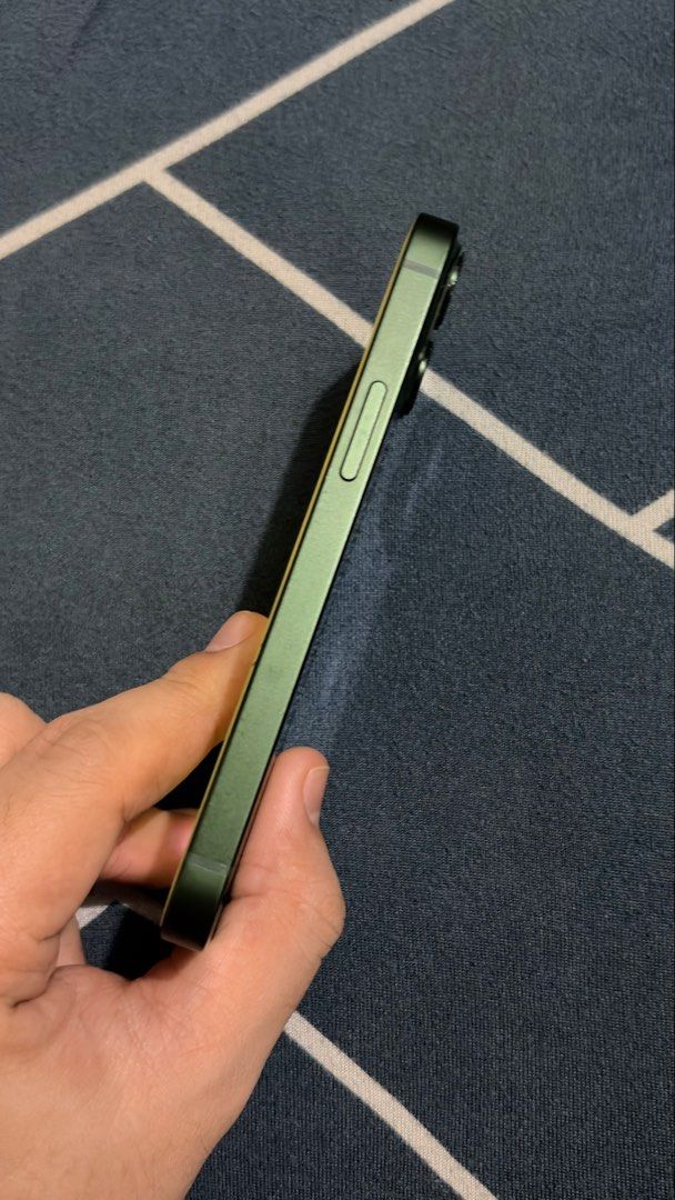 iPhone 13 Mini Green Any Sim (Category: iPhone 13 Series) located in Manila. Submitted by ChaEunWoooo (Listing ID 1469221022, Image 3). Description: 13 mini Green Used as Back Up phone for work 73% battery Can last a day All working Hindi pa po napapalitan yung battery, original battery Face ID is working Wala pa pong narerepair Phone and lightning cable only Meet up: sm sta mesa, cubao gateway Zero Nine Four Five Six Seven Zero One Seven Five Ni