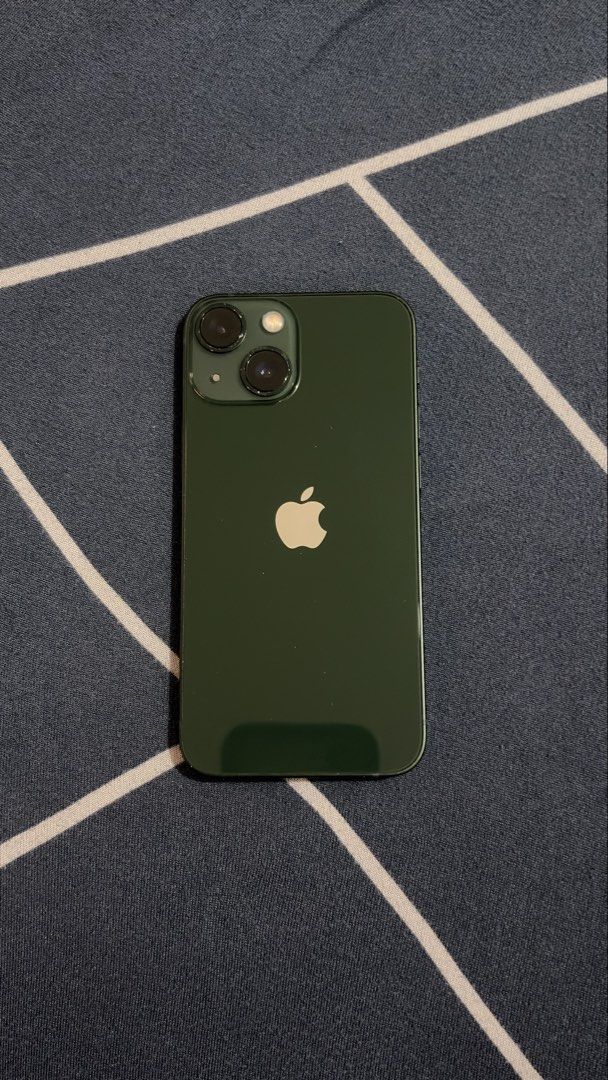 iPhone 13 Mini Green Any Sim (Category: iPhone 13 Series) located in Manila. Submitted by ChaEunWoooo (Listing ID 1469221022, Image 1). Description: 13 mini Green Used as Back Up phone for work 73% battery Can last a day All working Hindi pa po napapalitan yung battery, original battery Face ID is working Wala pa pong narerepair Phone and lightning cable only Meet up: sm sta mesa, cubao gateway Zero Nine Four Five Six Seven Zero One Seven Five Ni
