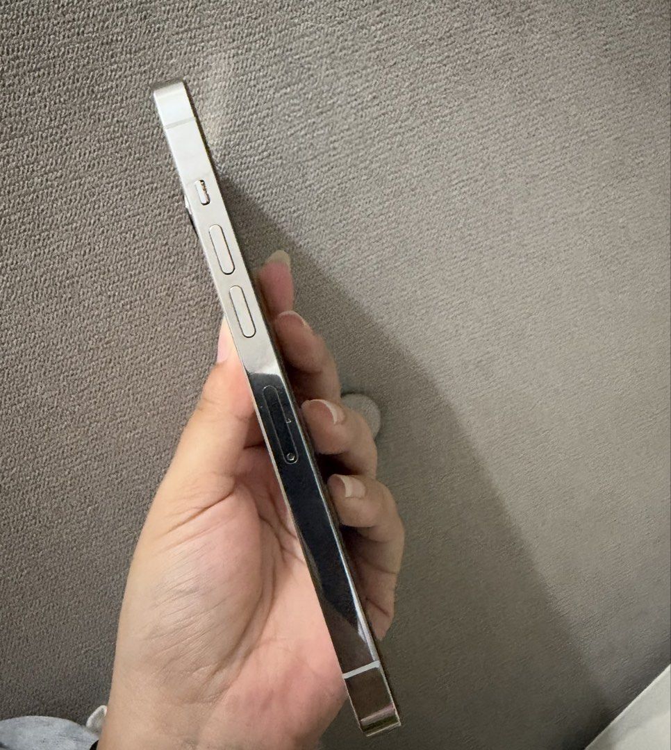 Iphone 13 pro 128 GB Silver (Category: iPhone 13 Series) located in Bacoor. Submitted by khaliesi (Listing ID 1469194616, Image 2). Description: Bought in 2022 | 75% Battery health In good condition, with a minimal dent on the side that is barely noticeable. Reason for Selling: Need funds for our family dog’s surgery. Feel free to message me for more details or photos. Thank you! RFS: surgery of family Dog.