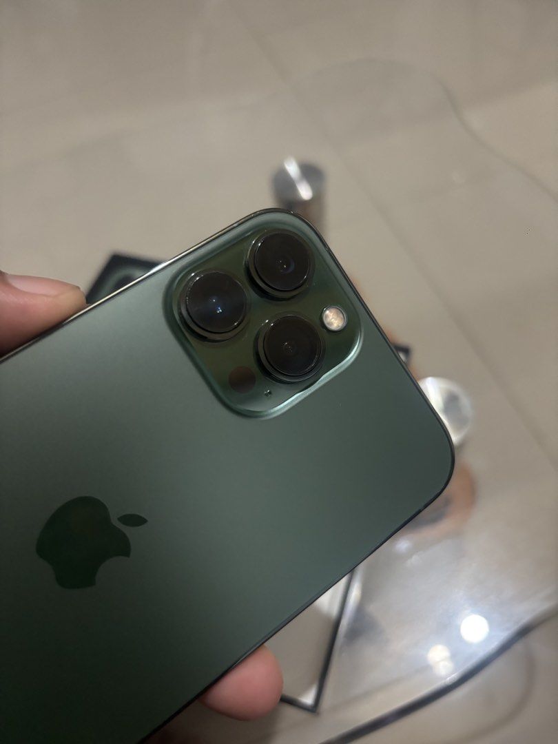 iPhone 13 Promax 128GB (Category: iPhone 13 Series) located in Quezon City. Submitted by khuuun (Listing ID 1469306169, Image 3). Description: iPhone 13 Promax 128GB Alpine Green NTC Approved Factory Unlock Presentable 78% BH No history of repair Honest minor issue : Black spot sa 3x portrait camera - Normal na sa pro and promax series. Pass sa barat ..