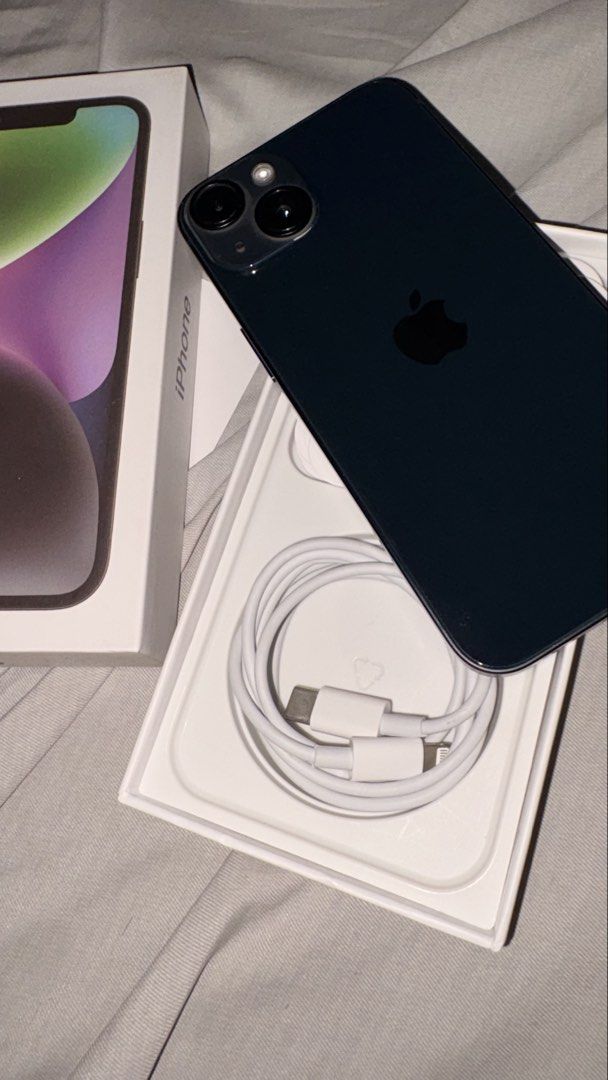 Iphone 14 (Category: iPhone 14 Series) located in Manila. Submitted by misweet (Listing ID 1469247106, Image 3). Description: FOR SALE: iPhone 14 128GB 📱 💰 Price: ₱23,500 (slightly negotiable) ✨ Excellent condition 🔋 100% battery health 📱 128GB storage 📶 Open-line — works with any SIM 🔌 Inclusions: Phone, charging cable, 2 free cases, and box (not the original box) ✅ No Parts and Service History shown in Settings 📦 RFS: Extra phone that is