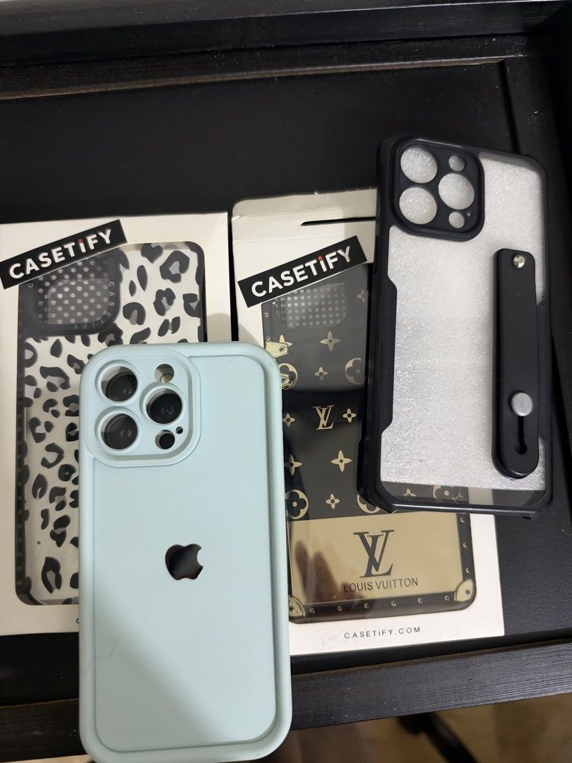 iPhone 14 promax case (bundle) (Category: Other Gadgets) located in Pasig City. Submitted by shopping_maven (Listing ID 1469348404, Image 1). Description: - Bundle of 4 trendy iPhone cases in various designs (Leopard print, LV style, black with stand/strap, and pastel light blue) - Great value set to switch up your phone's look depending on your mood or outfit - iPhone 14 Promax: pm for more photos - Meetups available at Capitol Commons Park, Pas