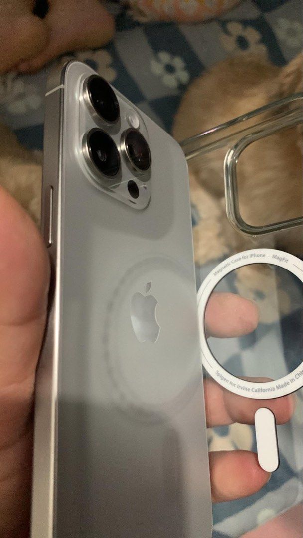 iPhone 15 Pro Max (Category: iPhone 15 Series) located in Pasig City. Submitted by ayubzkee (Listing ID 1469388324, Image 3). Description: - Model: iPhone 15 Pro Max - Storage: 256GB - Color: Natural Titanium battery health at 85% No sim restrictions & purchased via Smart With original box same IMEI, no charger cable - Condition: Pristine, flawless, no issues at all - Usage: Never abused, never used for gaming - Protection: Fitted with Spigen tem