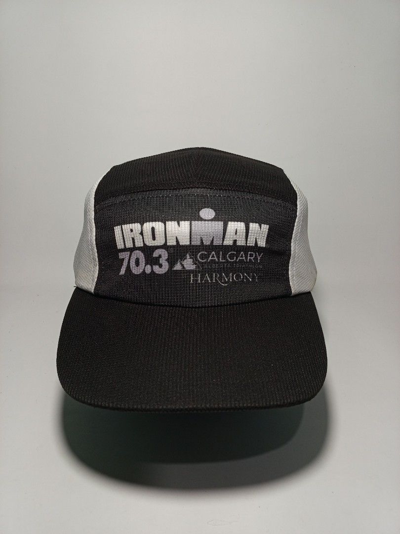 Ironman 70.3 Calgary Harmony Running Cap (Category: Caps & Hats) located in Lucena. Submitted by sanera_23 (Listing ID 1469348916, Image 1). Description: - Authentic Ironman 70.3 Calgary Harmony cap in black and white - Features a cool bull graphic on one side panel - Includes Plintz Real Estate branding on the other side - Adjustable white strap closure for a custom fit - Classic athletic design, great for training or casual wear - A must-have c
