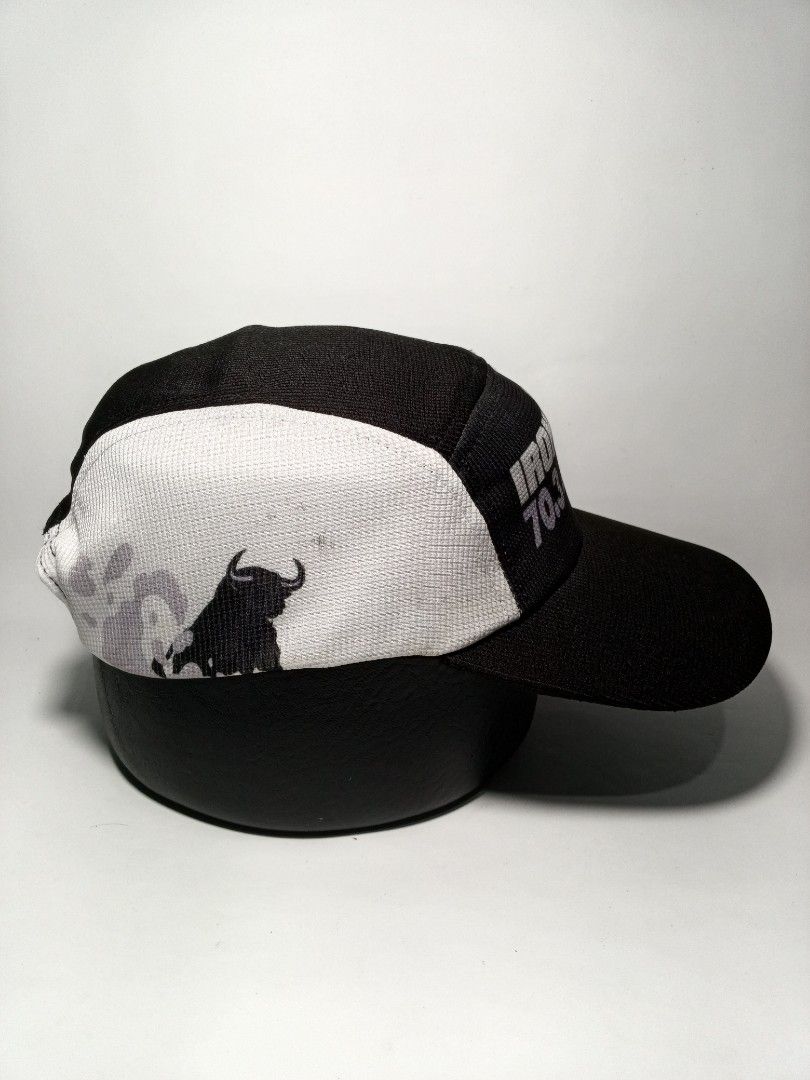 Ironman 70.3 Calgary Harmony Running Cap (Category: Caps & Hats) located in Lucena. Submitted by sanera_23 (Listing ID 1469348916, Image 2). Description: - Authentic Ironman 70.3 Calgary Harmony cap in black and white - Features a cool bull graphic on one side panel - Includes Plintz Real Estate branding on the other side - Adjustable white strap closure for a custom fit - Classic athletic design, great for training or casual wear - A must-have c