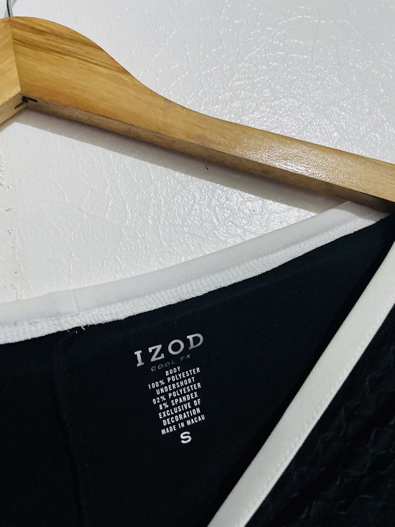 IZOD Cool FX Athletic Skort (Category: Skirts) located in Caloocan City. Submitted by lovemyclothes21 (Listing ID 1469266031, Image 3). Description: - Brand: IZOD - Size: Small - Color: Black with white and pink contrast details - Fabric: 100% polyester body with 92% polyester/8% spandex undershorts - Technology: Cool FX fabric for comfort - Features: Textured pattern and built-in undershorts for active movement - Condition: Clean and ready to we