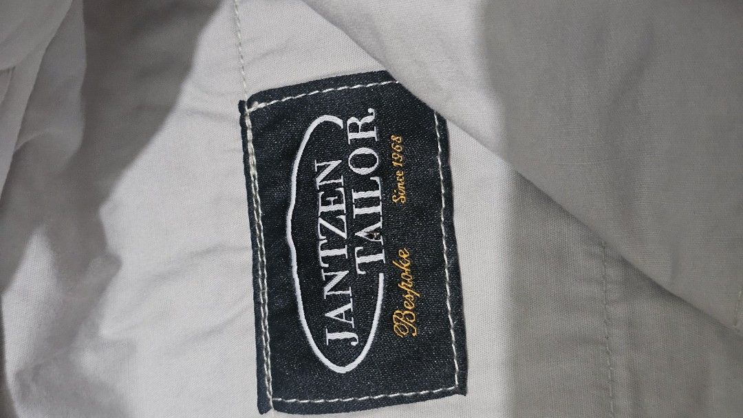Jantzen Tailor Bespoke Beige Trousers with Side Adjusters (Category: Trousers) located in Manila. Submitted by babie143 (Listing ID 1469314581, Image 3). Description: - Brand/Maker: Jantzen Tailor Bespoke (Est. 1968) - Color/Fabric: Clean beige/cream fabric with pressed creases - Style: Classic tailored trousers with side waistband adjusters - Details: Back pocket with secure button closure - Quality: Premium custom craftsmanship.