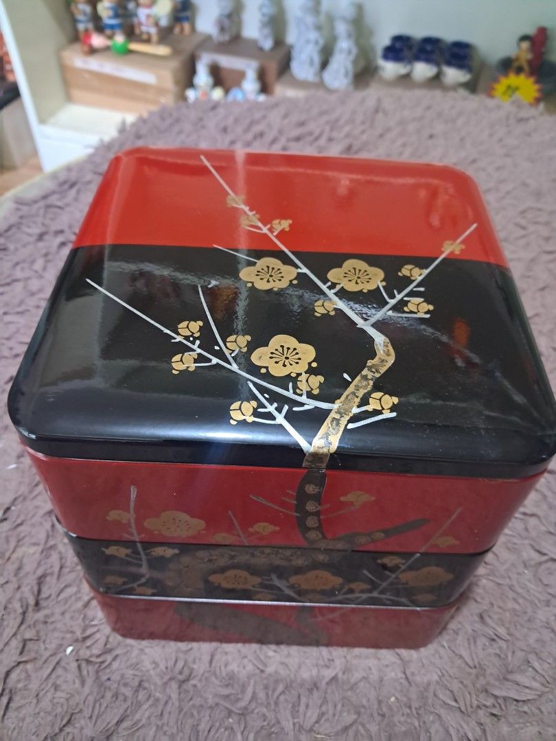 Japanese Lacquerware 3-Layer Display Box (Category: Storage Boxes & Baskets) located in Cavite. Submitted by secretjapansurplus (Listing ID 1469205859, Image 3). Description: Features a stunning black and red lacquer finish with elegant gold floral branch detailing. Perfect as a decorative centerpiece, jewelry/trinket organizer, or a beautiful addition to your home aesthetic. 📌 Product Details: • Dimensions: Approximately 6 inches x 6 inches (Le