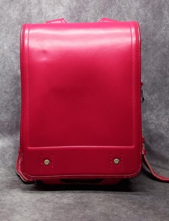 Japanese Randoseru School Backpack (Category: Backpacks) located in Davao. Submitted by lingxu23 (Listing ID 1469226703, Image 1). Description: - Traditional Japanese randoseru design - Crafted from durable synthetic leather - Structured rectangular shape with rigid box construction to protect your belongings - Comfortable wide shoulder straps and convenient top handle - Secure metal closure hardware on the front flap - Available in multiple colo