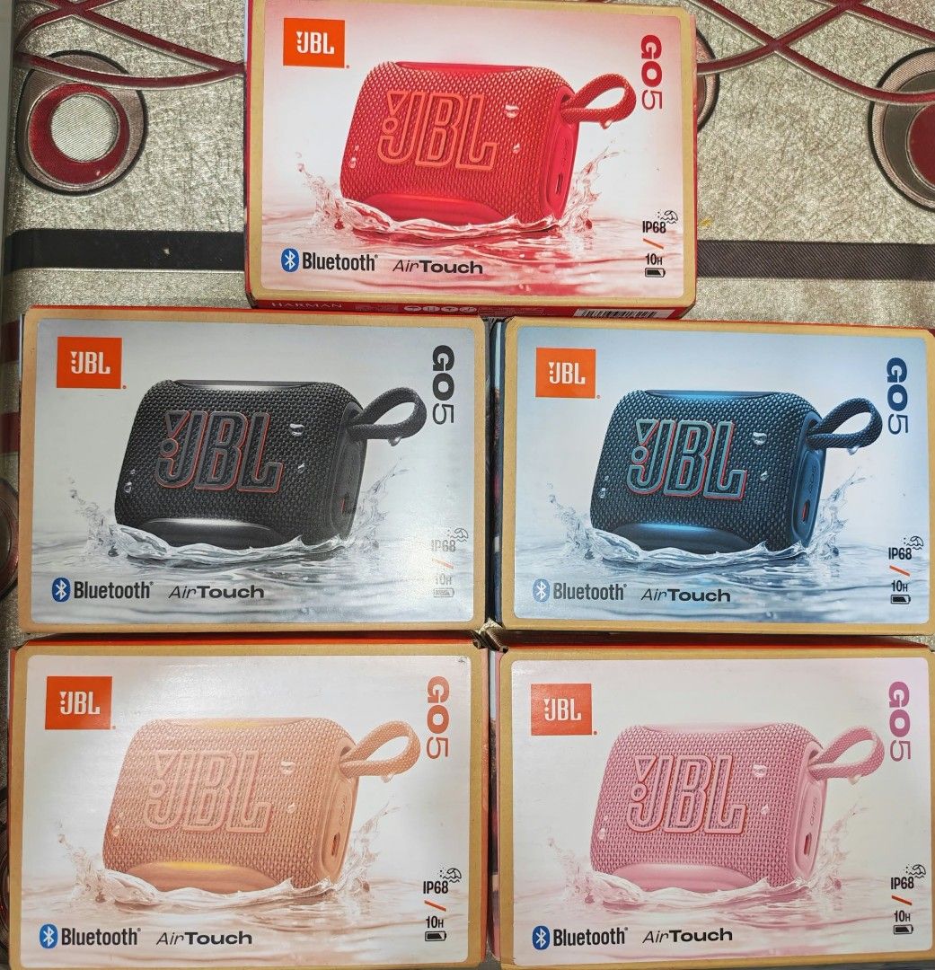 JBL GO 5 Bluetooth Portable Speaker (Category: Soundbars, Speakers & Amplifiers) located in Manila. Submitted by pinkymary05 (Listing ID 1469310288, Image 1). Description: - Brand new, unopened, and sealed in original packaging - Colors available: Red, Black, Blue, Orange, and Pink - IP68 waterproof and dustproof rating - Up to 10 hours of continuous playtime on a single charge - Seamless connectivity with Bluetooth and advanced AirTouch technolo