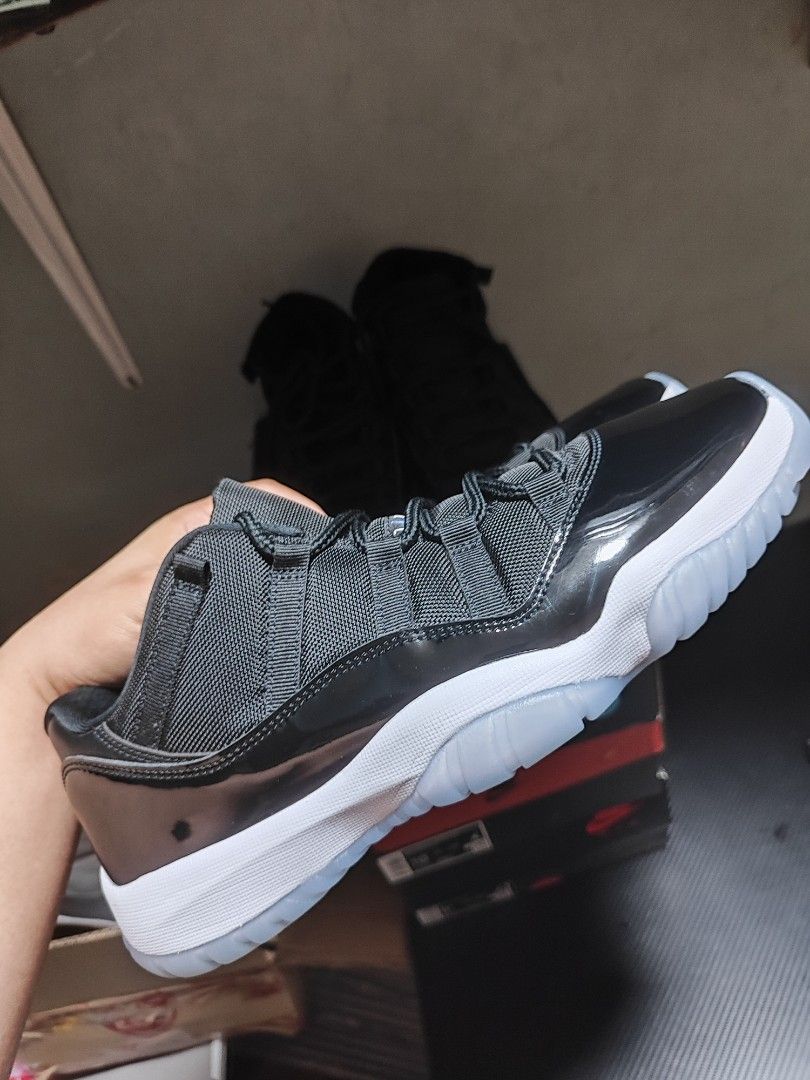 Jordan 11 Retro Low Black/White US 10 (Category: Sneakers) located in Angono. Submitted by jovitonav (Listing ID 1469224097, Image 1). Description: - Model: Jordan 11 Retro Low - Colorway: Classic Black and White - Size: US 10 / UK 9 / EUR 44 / CM 28 - Features: Iconic patent leather mudguard, breathable mesh upper, icy blue translucent rubber outsole, and carbon fiber shank plate - Condition: Clean soles with zero wear on tread - Availability: L