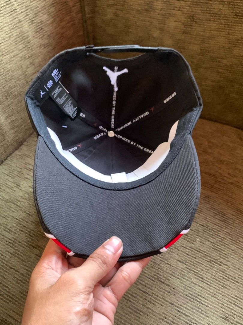 Jordan 1984 Snapback Cap Black Red (Category: Caps & Hats) located in San Juan City. Submitted by findmorelux (Listing ID 1469226015, Image 2). Description: - Authentic Jordan 1984 snapback cap - Colorway: Black with striking red panels and white piping - Embroidery: Script Jordan on front panel and 1984 numbering on the brim - Branding: Jumpman logo on the rear strap and interior taping - Fit: Adjustable black snap closure - Condition: Brand new